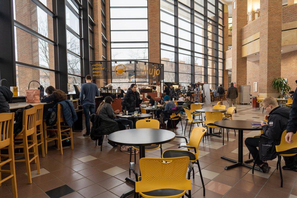 MuJo Cafe in the Atrium of the Duderstadt Center is a favorite gathering spot for study, meeting up with friends, or daydreaming with s snack and beverage