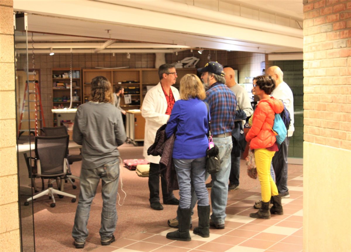 Group of people getting shown a lab