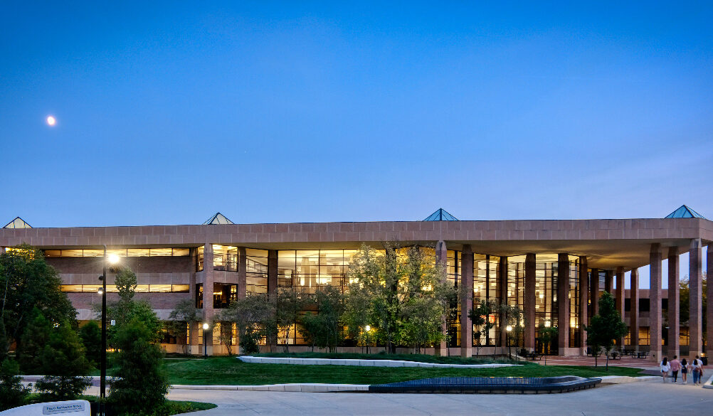 exterior of The James and Anne Duderstadt Center viewed at twilight
