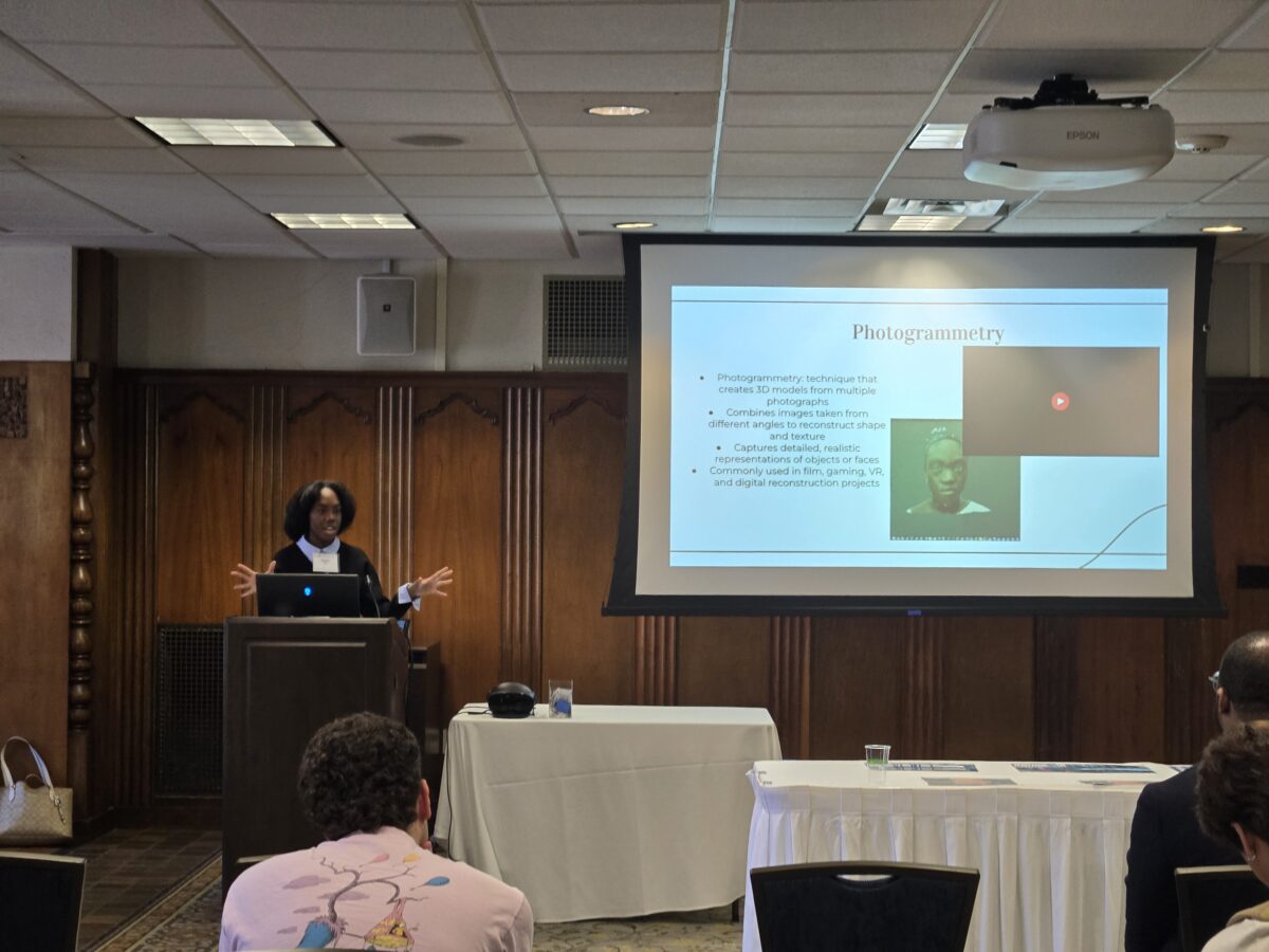 student researcher presenting the creative project at UROP