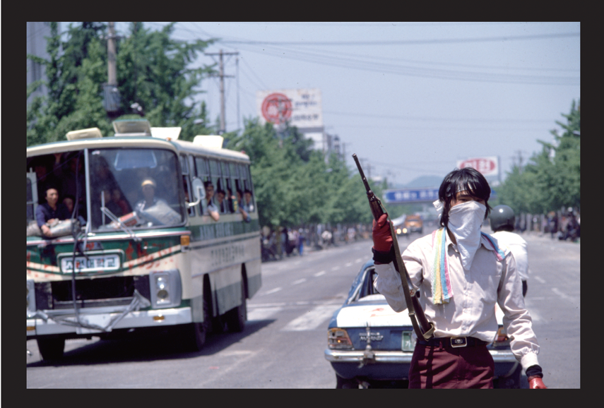 Photo of armed protestor during Korean protests for democracy.