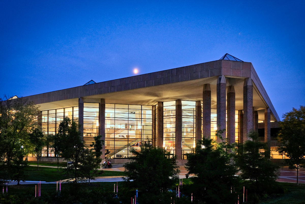 view of the exterior of The Duderstadt Center in the evening
