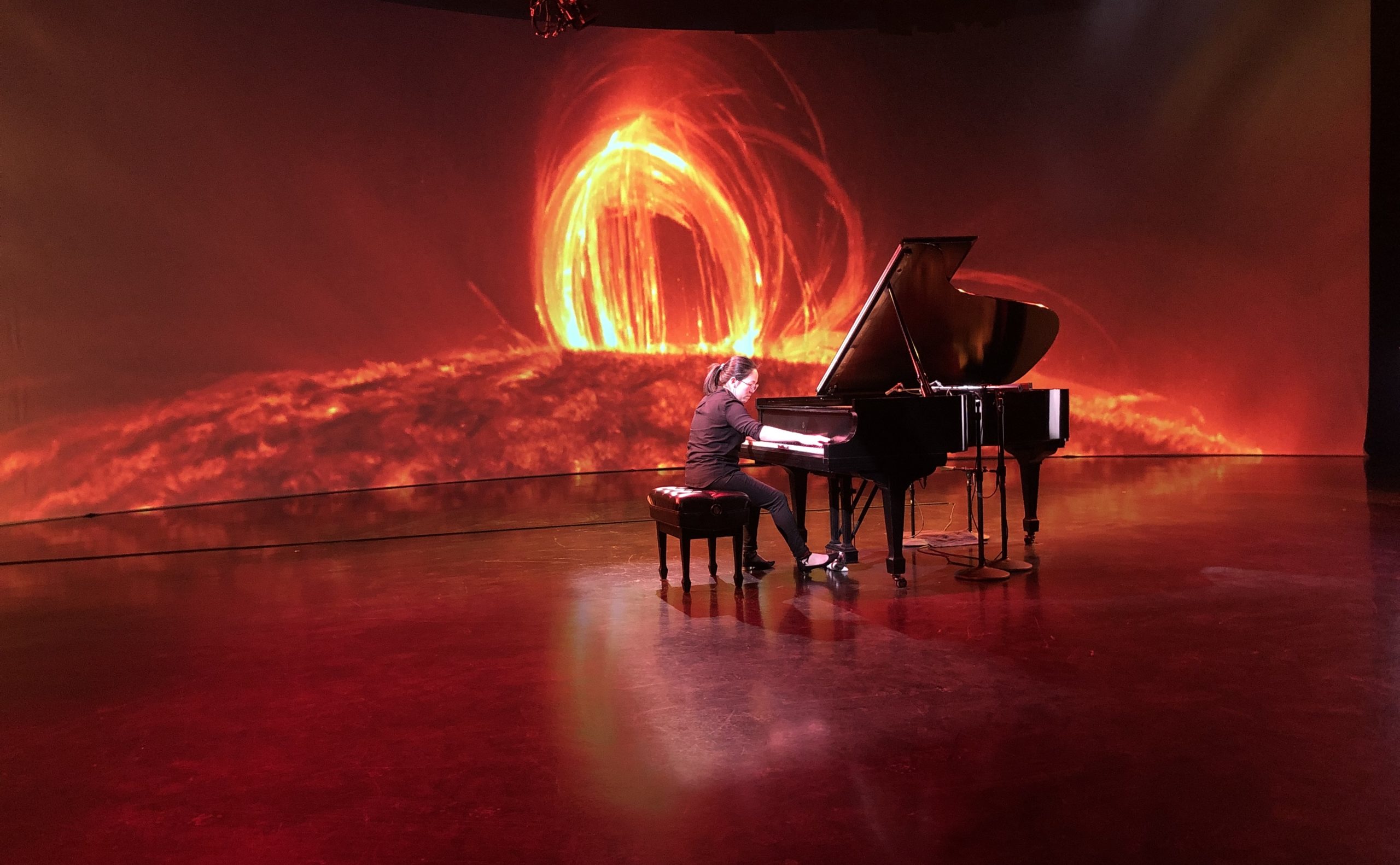Melissa Coppola performs her composition on the new Steinway grand piano, donated to the DMC Video Studio by the Demeulemeester family