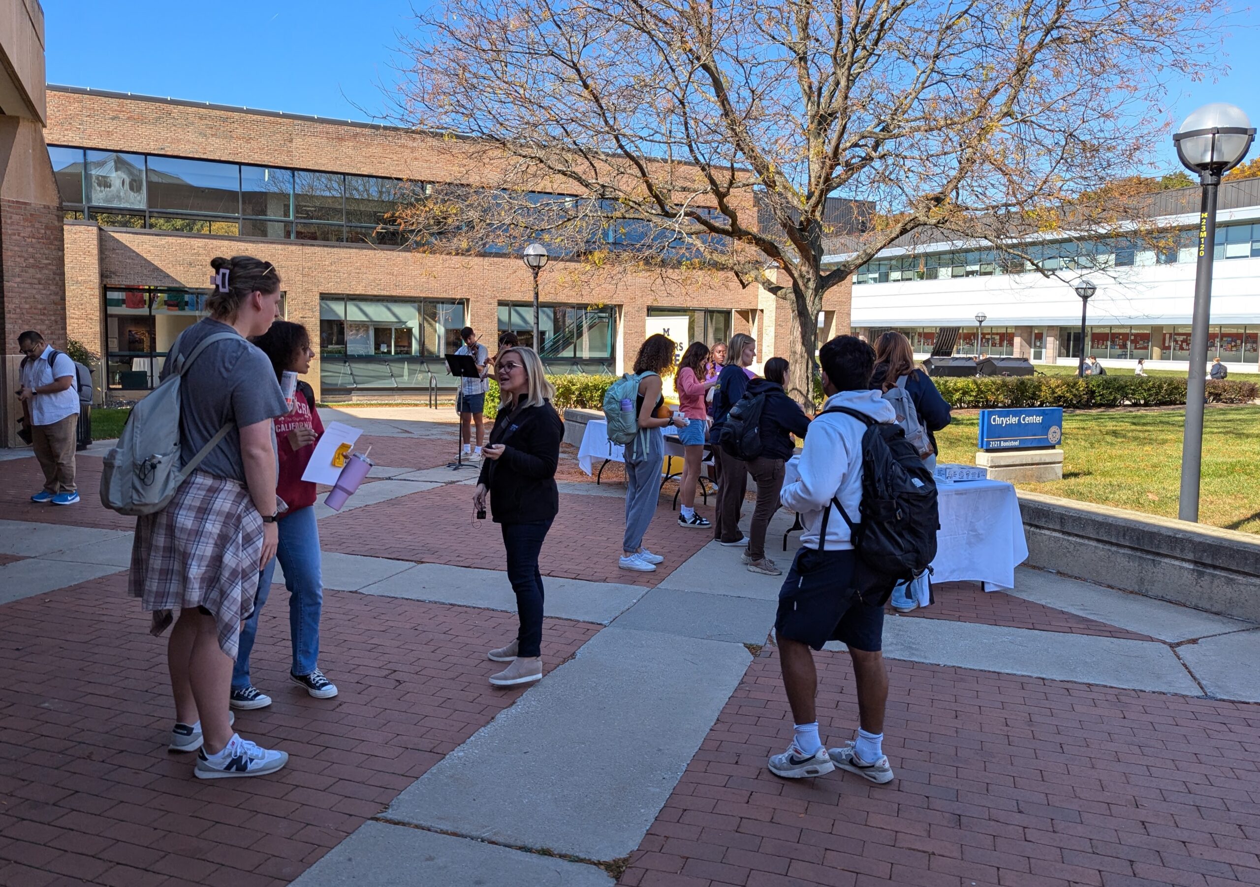 Photo of CBS reporter interviewing students.