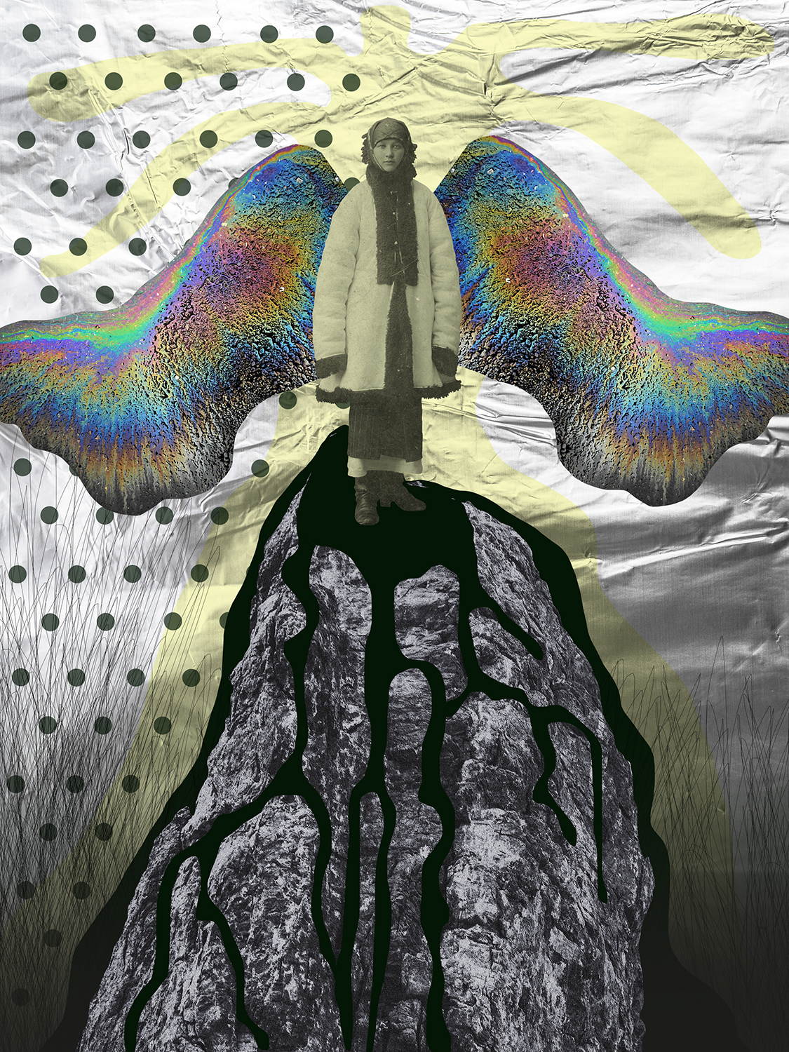 Woman with iridescent wings standing on a rock.