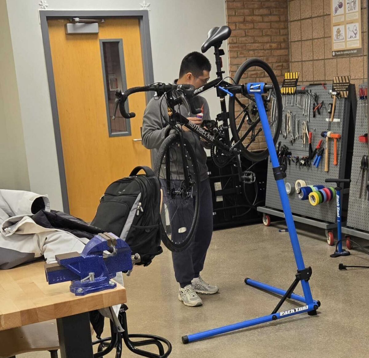 Student working on bike repairing in Fabrication Underground