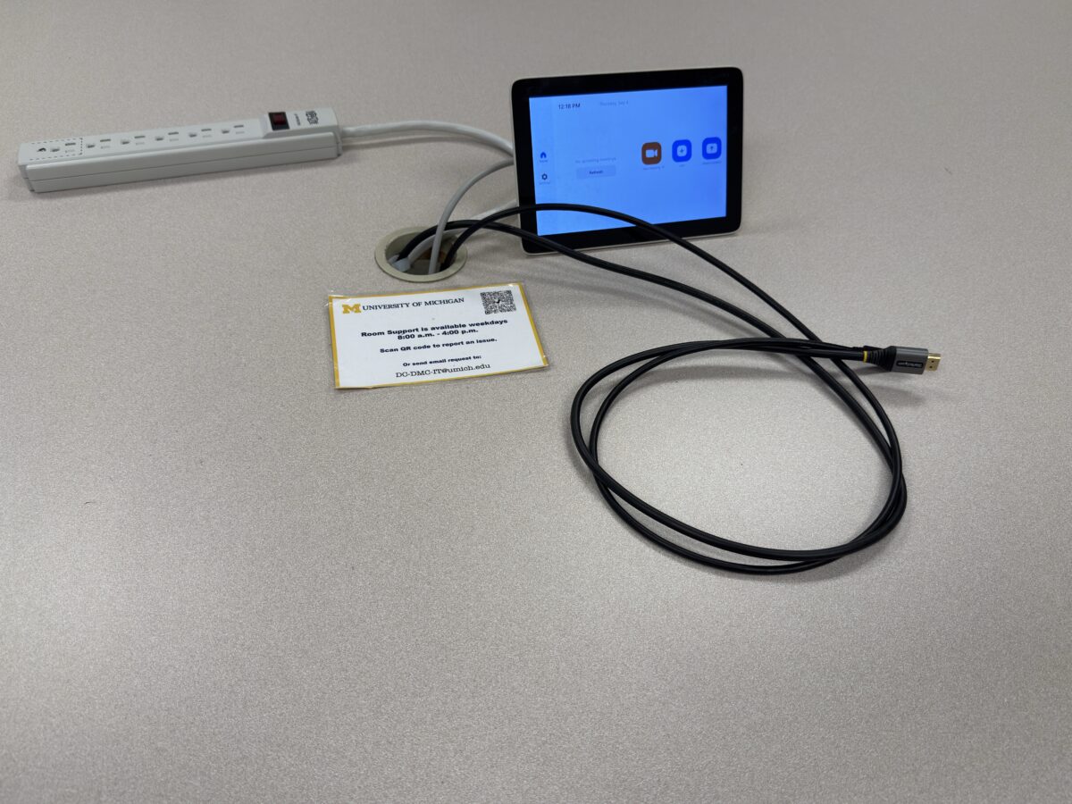 Zoom Rooms system located in conference room