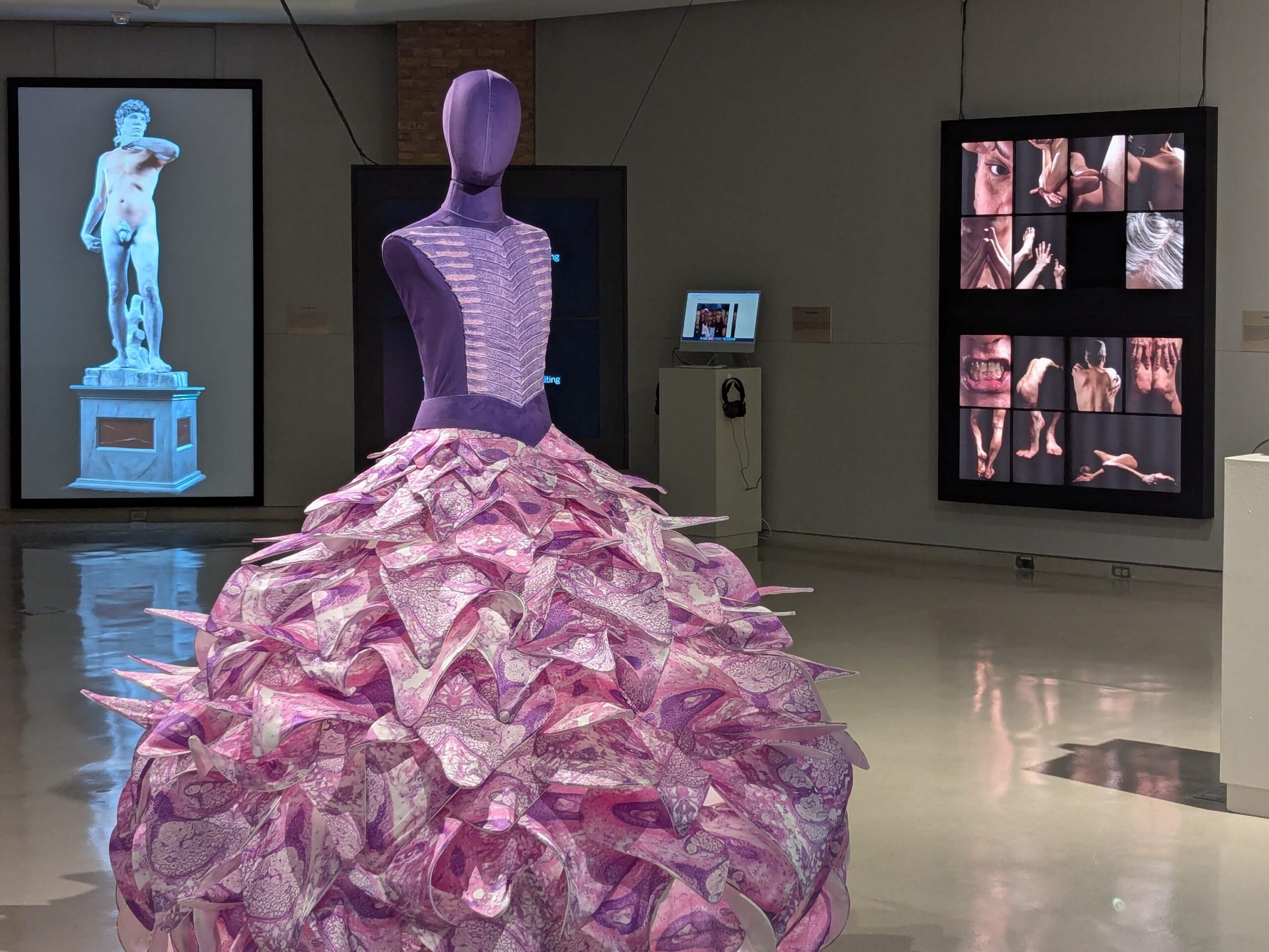 mannequin in pink dress in DC gallery