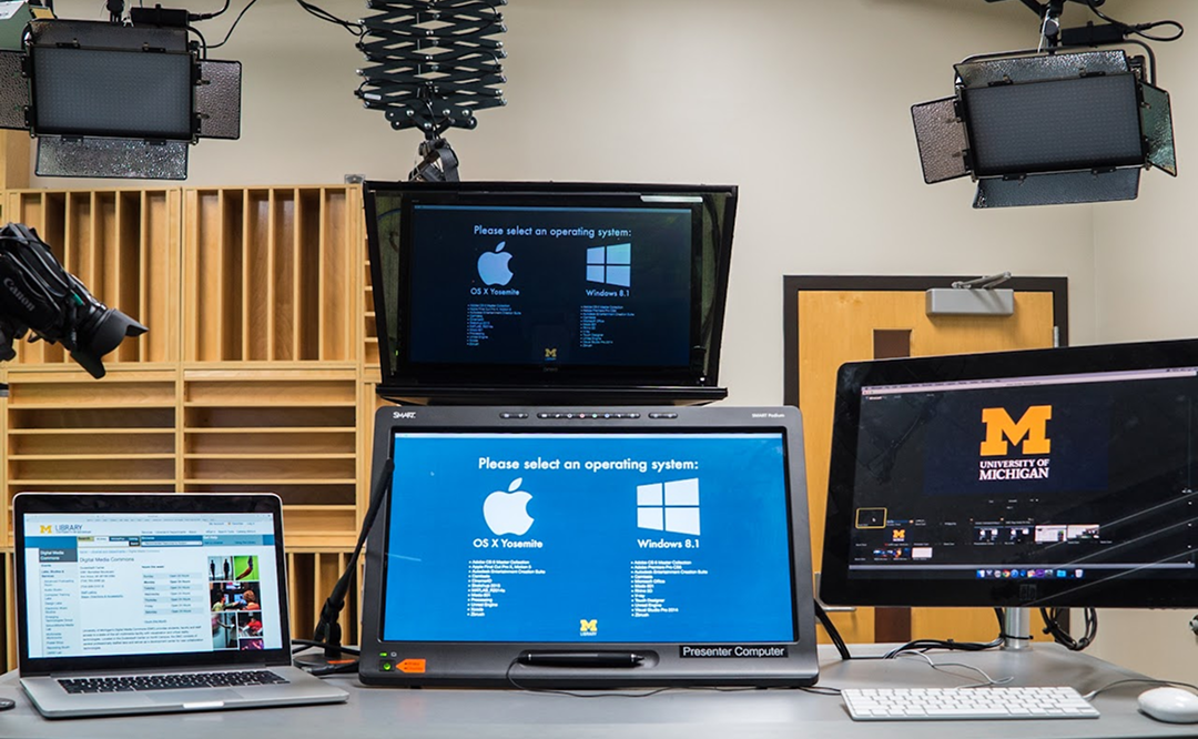 Laptops and monitors in personal studio