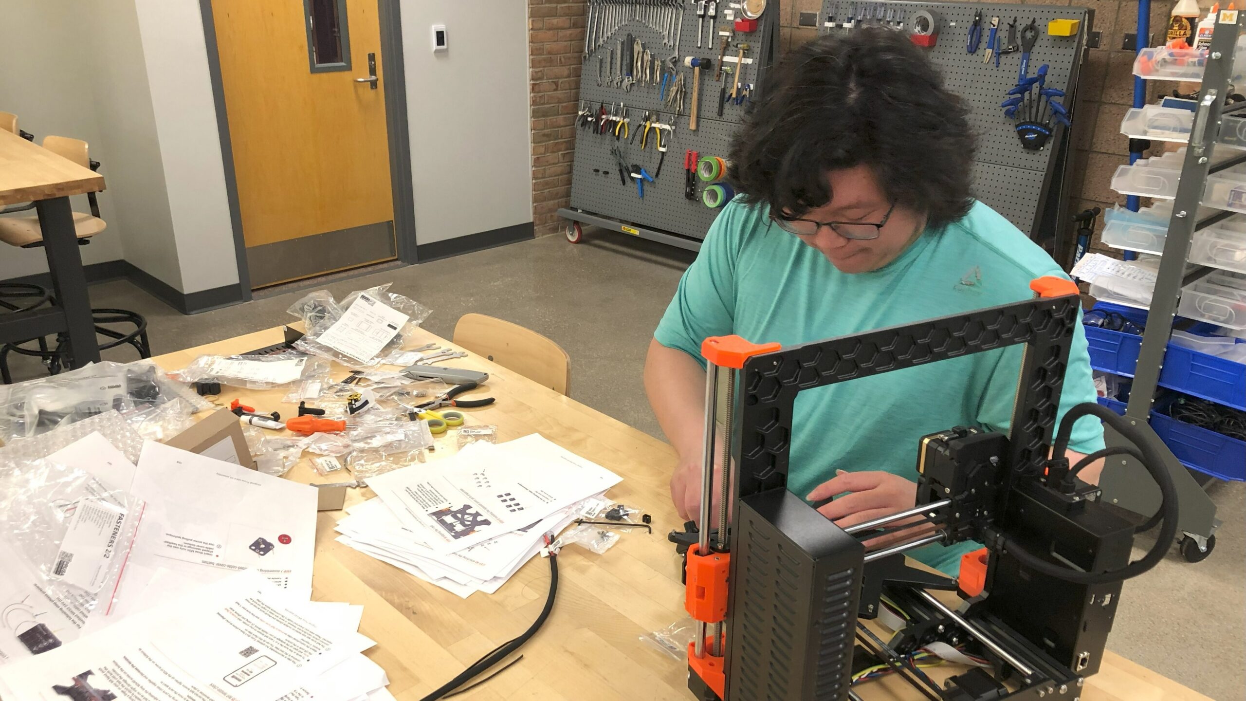 student working at workbench in Fabrication Underground