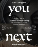 Black poster with white text and a shadowy face in the background.